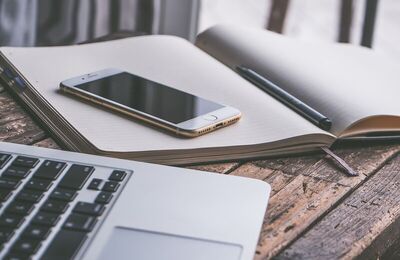 Smartphone, diary, laptop on the table Smartphone, diary, laptop on the table